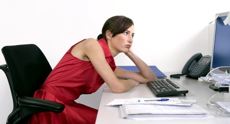 2. Woman at desk Woman at desk